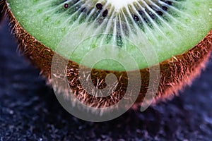 Kiwi fruit cutted. Healthy fruit kiwi cut for healthy fruit based nutrition. Green fruit with seeds, healthy and fresh diet for