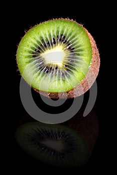 Kiwi fruit, slice of green juicy kiwi. isolated on black
