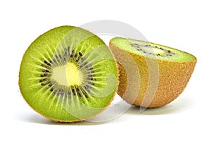 Kiwi fruit sliced in half on white background