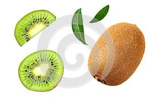 kiwi fruit with slices and green leaves isolated on a white background. top view