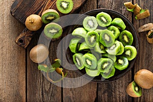 Kiwi fruit on wooden rustic table, ingredient for detox smoothie