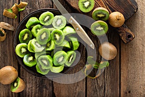 Kiwi fruit on wooden rustic table, ingredient for detox smoothie