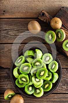 Kiwi fruit on wooden rustic table, ingredient for detox smoothie