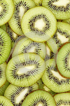 Kiwi fruits collection food background portrait format slices kiwis fresh fruit