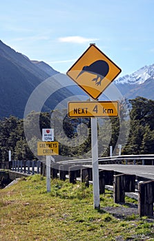 Kiwi next 4 km sign at Arthurs Pass, New Zealand.