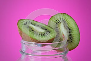 Kiwi with pink background photo