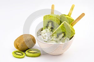 kiwi popsicle isolated on white background made with fresh fruits inside bowl with ice