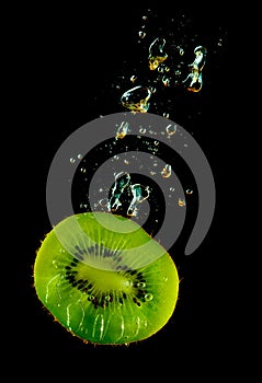 Kiwi sinking in water