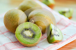 Kiwi slice on the table with kiwi fruit