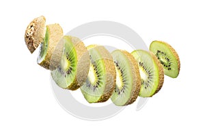 Kiwi sliced into slices hanging in the air. Concept fruit photography