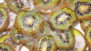 Kiwi slices becomes dry and wrinkled. Fruit dehydrates quickly.