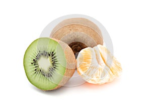 Kiwi and tangerine isolated on white background