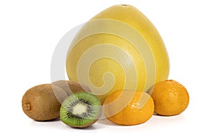 Kiwi, tangerines and pomelo on a white background. Foreground