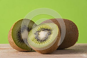 Kiwi, two-piece composition with green background.
