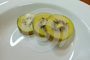 Kiwifruit or Chinese gooseberry, is the edible berry of several species of woody vines in the genus Actinidia.