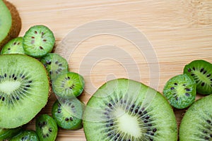 Kiwifruit and Kiwi berries with copy space
