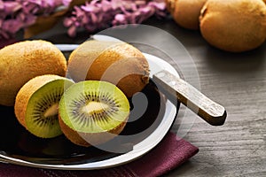 Kiwifruit served on plate photo