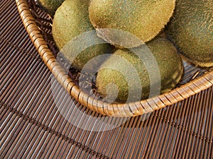 Kiwis in a rattan baske