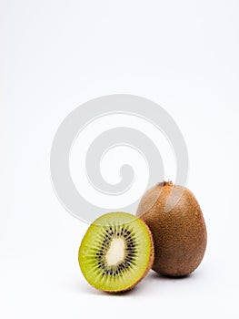 Kiwis on white background with copyspace above