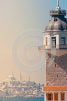 Kiz Kulesi aka Maiden's Tower and Suleymaniye Mosque on the background photo