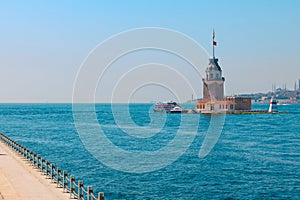 Kiz Kulesi or Maiden's Tower with cityscape of Istanbul. photo