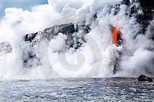 KiÌ„lauea volcano lava flow pours into ocean in Hawaii