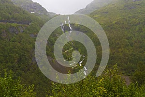 Kjosfossen Falls rainy summer day view Norway