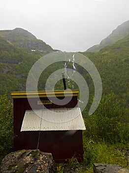 Kjosfossen Falls rainy summer day view Norway