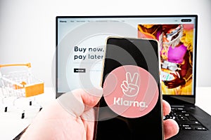 Klarna buy now pay later text on laptop with klarna logo
