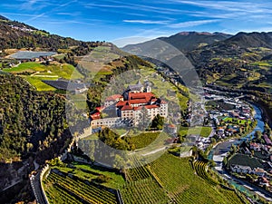 Klausen, Italy - Aerial view of the SÃÂ¤ben Abbey Monastero di Sabiona with Chiusa Klausen comune photo