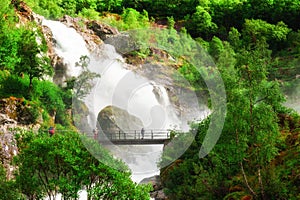 Kleivafossen waterfall near Briksdal glacier in Norway