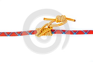 Klemheist or French Machard knot, isolated on white background. Similar to a Prusik knot, this friction hitch grips the rope.