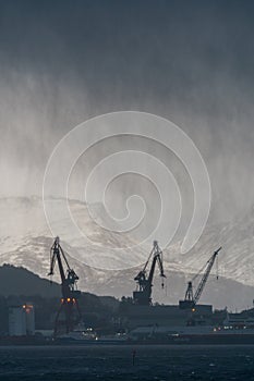 Kleven Yard with dark rainy clouds above