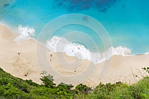 Klingung sand beach with light blue ocean water of Aerial view. Klingung beach is apart of one day traval trip of the eastern in