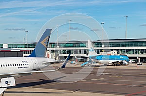 KLM and Air Astana Planes in Schiphol Airport