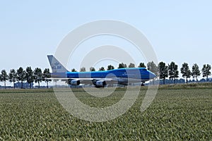 KLM Royal Dutch Airlines jet taxiing in Schiphol Airport, AMS