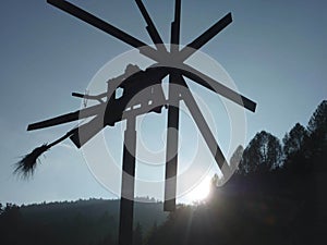 Klopotec bird scarer in austrian vineyard at sunset, southern st