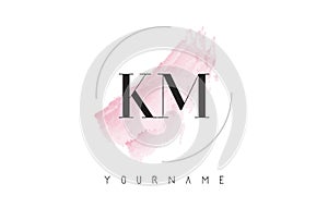 KM K M Watercolor Letter Logo Design with Circular Brush Pattern photo