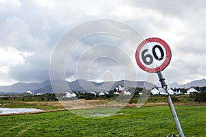 60 KM maximun speed sign on a road in Leknes, Norway photo