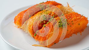 Knafeh -  a Middle Eastern cheese pastry soaked in sweet, sugar-based syrup