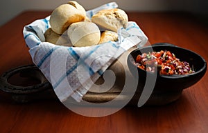 knead bread and chilean pebre sauce photo