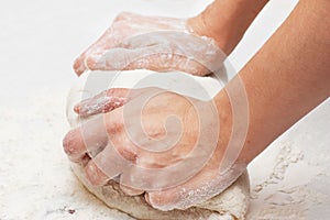 Kneading dough photo