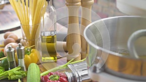 Kneading dough in kneader machine on italian pasta and spaghetti background. Kitchen mixer makingdough for homemade