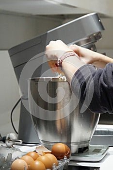 Kneading machine, kitchen view, preparing a cake