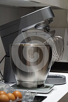 Kneading machine, kitchen view, preparing a cake