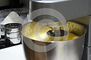 Kneading machine, kitchen view, preparing a cake