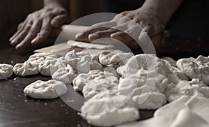 Kneading with stick, dough for empanadas or Argentinean cakes