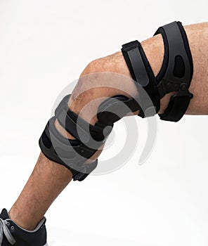 Knee brace for knee injury.