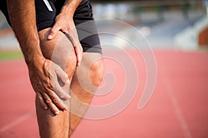 Knee Injuries. young sport man with strong athletic legs