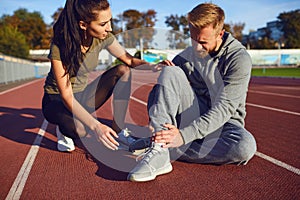 Knee injury in training. A male injured his leg during exercise.